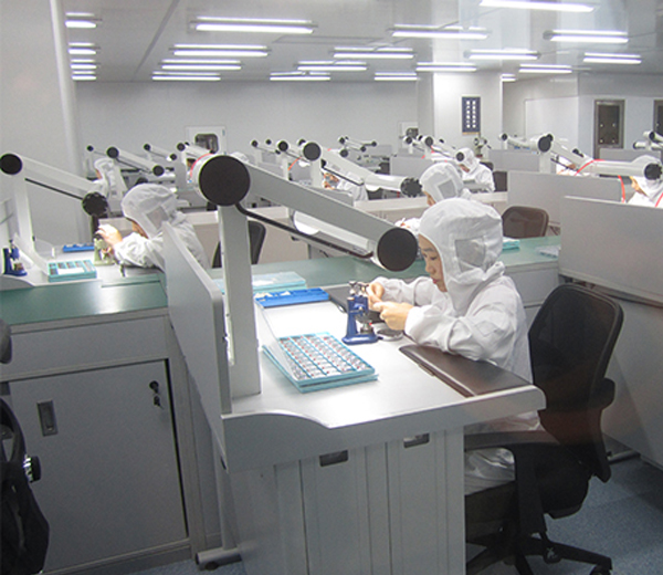 Workers-concentrating-on-watches-making